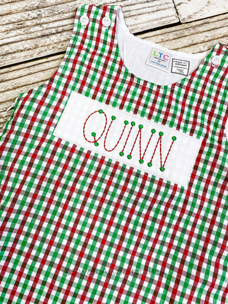 Girls monogrammed red, green and white gingham Christmas dress, jumper style toddler Christmas outfit with Faux smock nameplate design