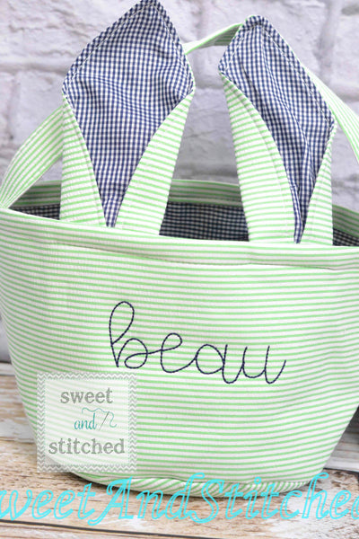 Monogrammed Easter baskets in pink, purple, green and blue seersucker
