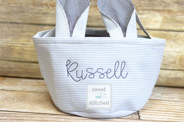 Monogrammed Easter baskets in pink, purple, green and blue seersucker
